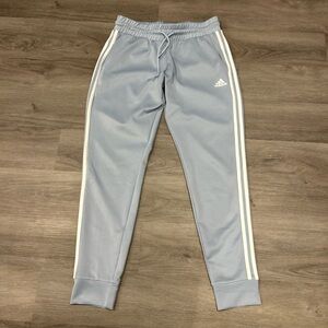 Adidas Women's Light Blue Joggers with White Stripes
